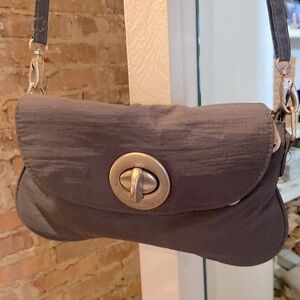 Small grey crossbody travel purse